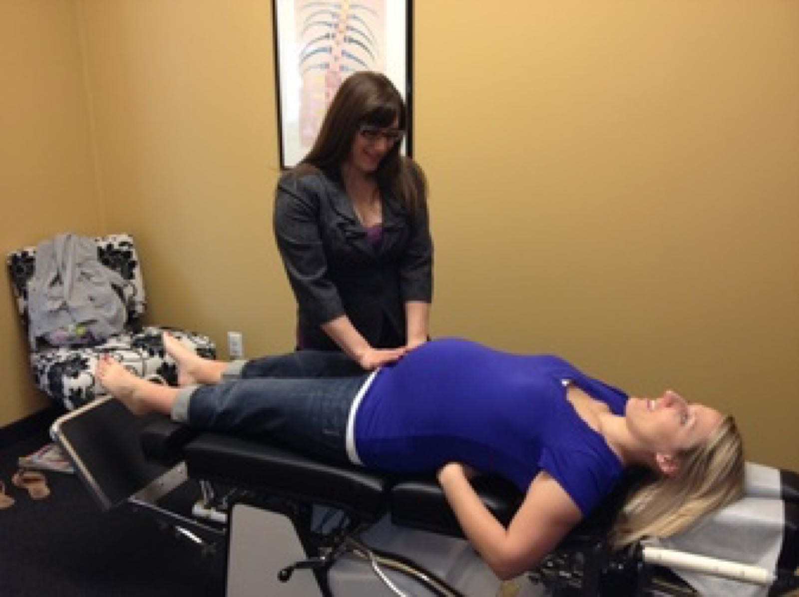 Adult patient receiving a chiropractic adjustment